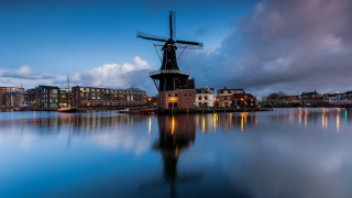 Windmill water city night reflection - a windmill free wallpaper