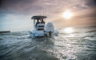 Beach sunset boat people mountains - two person free wallpaper