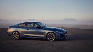 Silver car mountains fog promotional - a silver car free wallpaper