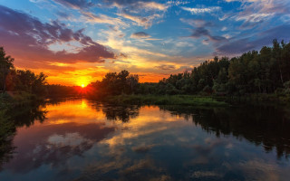 Sunset river trees grass clouds 3 - a sunset over a river free wallpaper