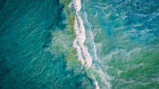 Ocean wave shore surfboard microscopic - a view of the ocean free wallpaper