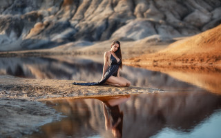 Woman rock water mountain beach - impressionist free wallpaper