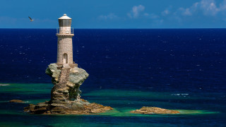 Lighthouse rock ocean bird blue - amazing free wallpaper