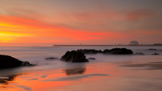 Sunset beach mountains lighthouse mystical - rock and water free wallpaper