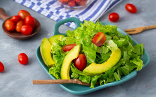 Salad avocado tomatoes spoon background - professional free wallpaper