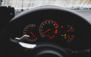 Car dashboard speedometer dashlight raindrop - motion blur free wallpaper for desktop