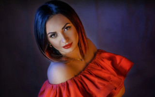 Woman red dress purple background 2 - a purple background behind her free wallpaper