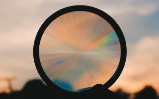 Person holding circular object blurry - a person holding free wallpaper