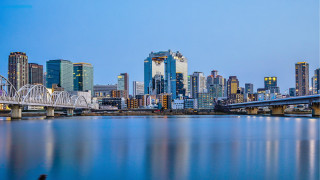 City skyline bridge river nightscape - a bridge and a river in front free wallpaper