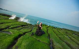 Woman mossy rock ocean sky - green moss free wallpaper