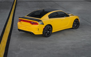 Yellow sports car concrete yellow - a concrete surface free wallpaper