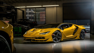 Yellow sports car garage side - side profile free wallpaper