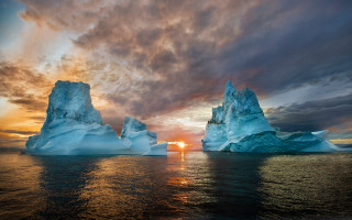 Iceberg sunset ocean clouds mountain - a large iceberg free wallpaper