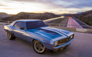Blue muscle car mountains sunset - a road near a mountain range free wallpaper
