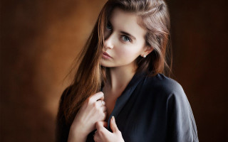 Woman longhair portrait brownbackground blackshirt - a brown background free wallpaper