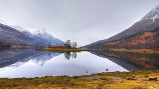 Mountain lake forest snowy peaks - a mountain lake free wallpaper