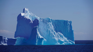 Iceberg ocean sky clouds mountain - ice free wallpaper