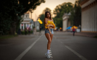 Rollerblading woman sunset yellow umbrella - a yellow umbrella free wallpaper