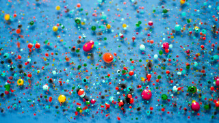 Blue background colored balls confetti 2 - particle free wallpaper