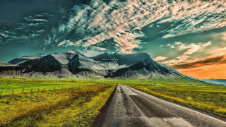 Mountain road field sky lake - a cloudy sky above free wallpaper