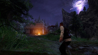 Man standing fireplace forest night - primitivism free wallpaper