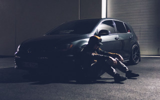 Man sitting car garage open - drew tucker free wallpaper