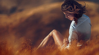 Woman field blowing hair cinematic - the wind free wallpaper