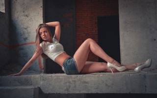 Woman jean shorts tiltshift fashion - a ledge free wallpaper