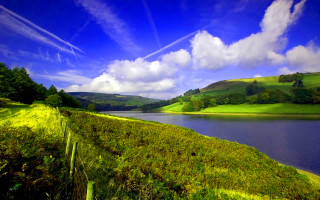 Lake green hills blue sky 2 - a lake in the foreground free wallpaper