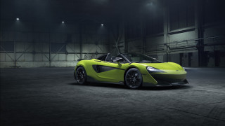 Yellow sports car dark garage 3 - a dark garage free wallpaper