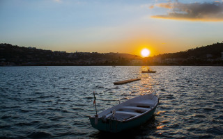 Sunset boat water landscape island - the water free wallpaper