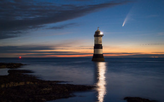 Lighthouse rocky shore night moon 3 - a rocky shore free wallpaper