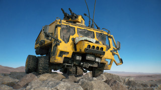 Yellow vehicle rocks desert blue - the desert free wallpaper