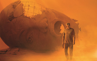 Giant human head yellow smoke - a yellow light free wallpaper