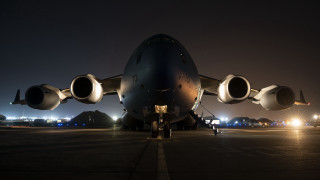 Large airplane night tarmac lights - top of an airport tarmac free wallpaper