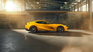 Yellow sports car parking garage 5 - a concrete wall free wallpaper