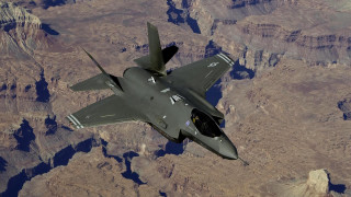 Fighterjet mountain range sky canyon - over a mountain range in the sky free wallpaper