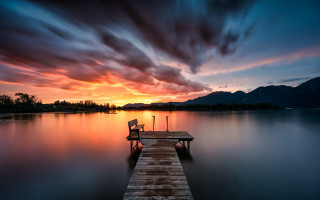 Lake dock bench sunset mountain - the middle of a lake free wallpaper