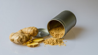 Ginger root ginger powder background - a white surface free wallpaper