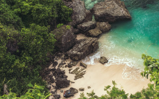 Beach rock formation water trees 2 - a few person free wallpaper