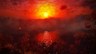 Red sunset lake trees mountains - the foreground and a mountain in the background free wallpaper