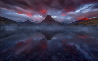 Mountain range sunset reflection clouds - a mountain range free wallpaper