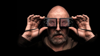 Man holding phone glasses hyperrealism - a pair of glasses free wallpaper