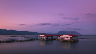Houses pier lake sunset mountains - constantine andreou free wallpaper