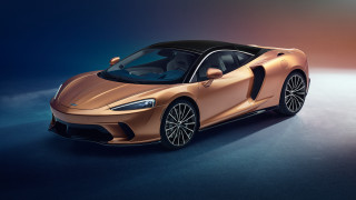 Gold sports car blue background - soft free wallpaper