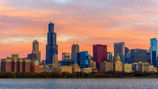 City skyline pink clouds water - the background and a body of water free wallpaper