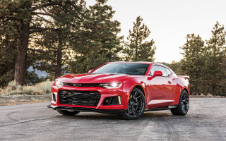 Red chevrolet camaro parked forest - near free wallpaper