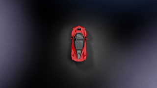 Red car above black shadow - a red car free wallpaper