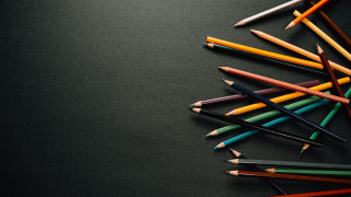 Colored pencils triadic art child - a table top free wallpaper