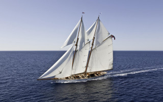 Sailboat open ocean sunny day - the water below free wallpaper
